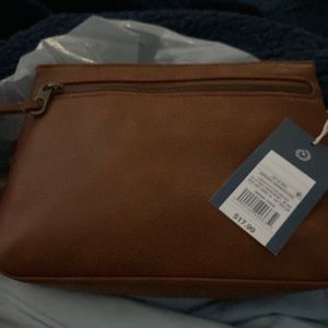 NWT clutch or crossbody tan purse.